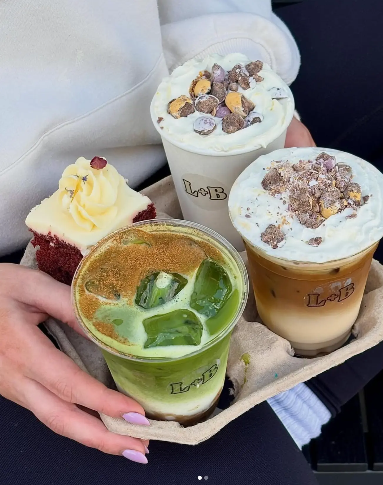 A takeaway tray of iced matcha, iced coffee and a slice of red velvet cake from Leaf + Bean